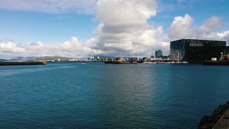 Time-lapse-of-boats-and-ships-arriving-and-leaving-from-the-main-harbor-area-of-Reykjavik,-the-Capital-city-of-Iceland