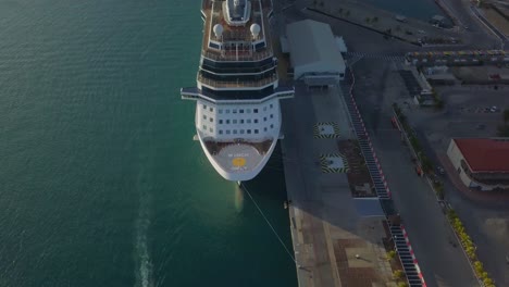 Aerial-close-up-view-of-the-bow-on-the-cruise-ship-a-still-and-pan-shot-with-movement-in-the-water-4K