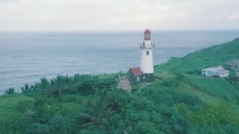 Cinematic-aerial-drone-video-of-a-romantic-lighthouse-of-Basco-Batanes-in-the-Philippines