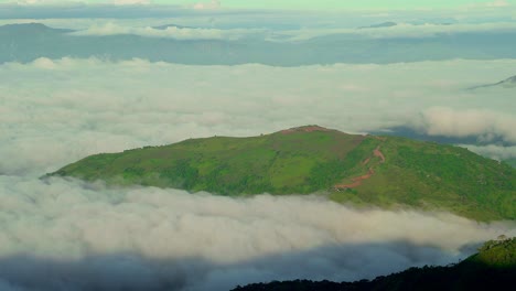 Breathtaking-view-of-clouds-passing-through-mountain