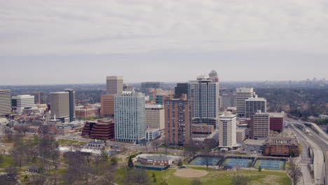 Wide-Drone-Shot-Over-Park-and-Buildings-in-St