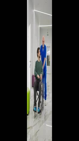 Vertical-video-of-a-confident-elderly-man-in-glasses-with-a-gray-beard-and-in-a-blue-doctors-uniform-carries-a-brunette-man-in-a-special-wheelchair-for-the-disabled-after-during-rehabilitation-after-fractures-in-a-modern-clinic