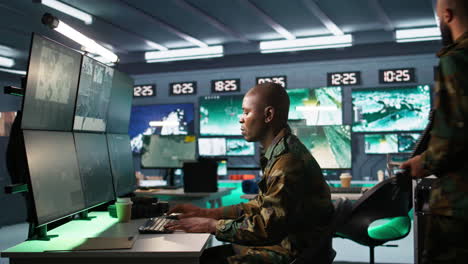 Intelligence-operative-in-military-base-doing-surveillance-with-radar