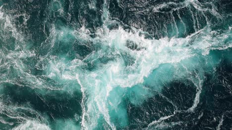 Blue-waves-of-water-of-the-river-and-the-sea-meet-each-other-during-high-tide-and-low-tide.