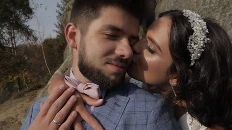 Groom-with-bride-near-mountain-hills.-Wedding-couple.-Happy-family-in-love