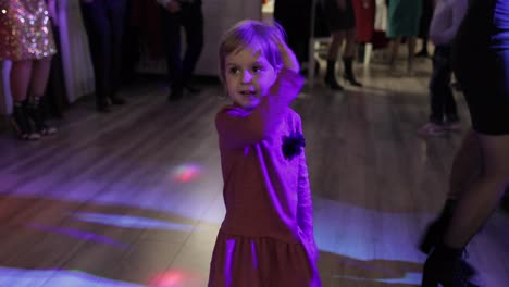 Little-child-dance-in-the-patry.-Feel-happy,-smiling.-Girl-having-fun-on-disco