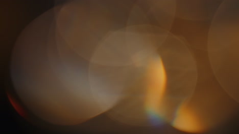 Mehrfarbiges-Licht-Leckt-4K-Videos-Auf-Schwarzem-Hintergrund,-Stilisierendes-Video,-Übergänge,-Bokeh-Effekt