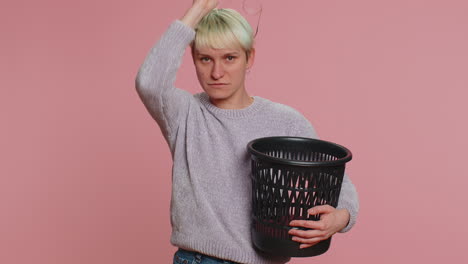 Woman-with-short-hair-taking-off,-throwing-out-glasses-into-bin-after-vision-laser-treatment-therapy