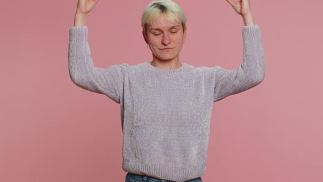 Woman-breathes-deeply-with-mudra-gesture,-eyes-closed,-meditating-with-concentrated-thoughts-alone