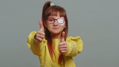 Happy-preteen-child-girl-kid-showing-thumbs-up-like-sign-positive-something-good-positive-feedback