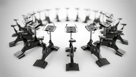 Animation-of-modern-gym-equipment-stationary-bikes-standing-in-a-circle.-Indoor-cycling-activity-machines-helping-to-stay-fitness-even-if-the-weather-outside-is-not-good-for-a-ride.-Loopable.-HD