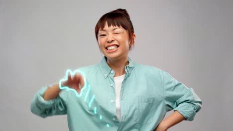 Happy-Asian-Woman-Dancing-with-Glowing-Lines.leisure-and-people-concept--happy-asian-woman-dancing-over-grey-background-with-animated-glowing-neon-lines