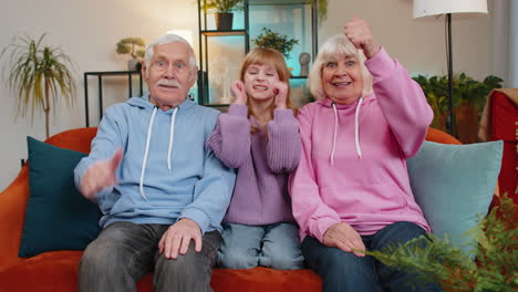 Child-girl-granddaughter-with-grandparents-showing-thumbs-up-like-sign-positive-positive-feedback