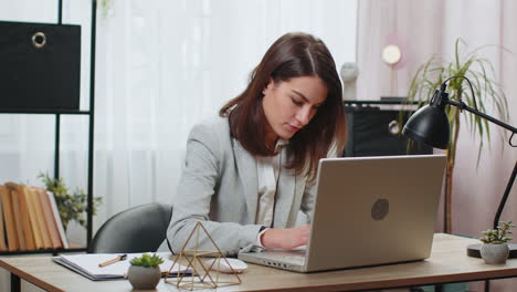 Business-busy-woman-thinking-about-an-important-creative-project-work-laptop-decision-at-home-office