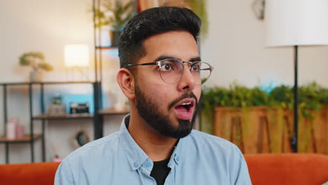 Surprised-amazed-shocked-Indian-man-wearing-eyeglasses-with-wow-reaction-open-mouth-good-win-news