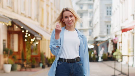 Cheerful-rich-happy-woman-showing-wasting-throwing-money-around-hand-gesture-big-profit-win-lottery