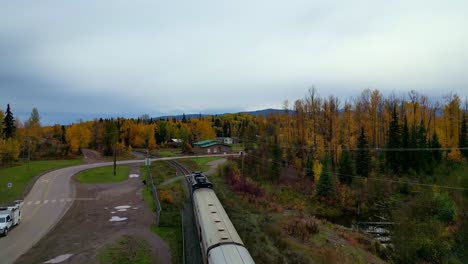 Passenger-Train-Via-passing-bridge-and-crossing-in-Telkwa,-BC