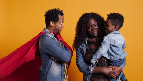 African-american-dad-being-the-superhero-of-his-little-toddler