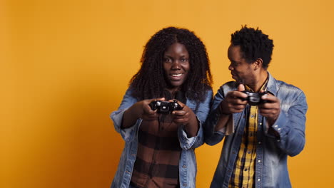 African-american-man-beating-his-wife-at-video-games-tournament-online