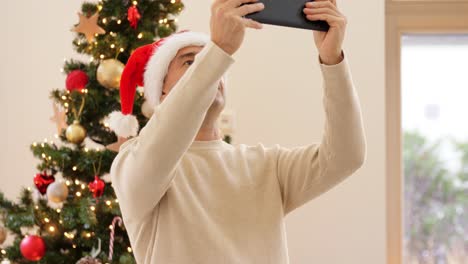 Man-With-Tablet-PC-Having-a-Video-Chat-In-The-Bus.Happy-young-man-having-a-video-chat-on-touch-pad-during-evening-road-trip-in-the-bus