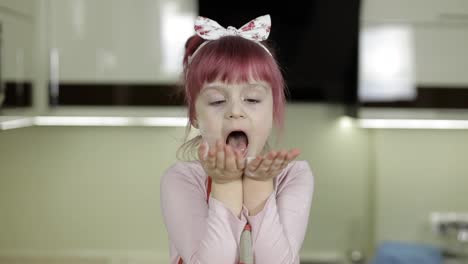 Cooking-pizza.-Little-child-playing-with-flour-gets-her-hands-dirty-in-kitchen