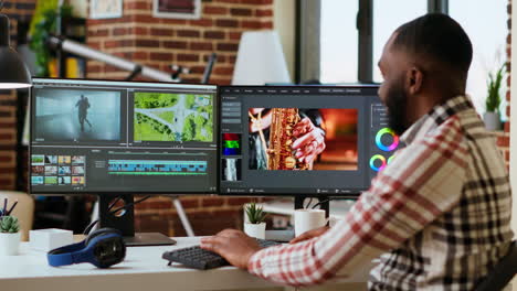 African-american-freelancer-editing-a-background-video-at-his-home-office