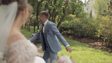 Newlyweds.-Caucasian-groom-with-bride-in-the-park.-Wedding-couple.-Happy-family