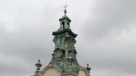 Aerial-drone-view-footage-of-Latin-Cathedral-church-dome-in-city-Lviv-Ukraine,-cloudy-sky-background