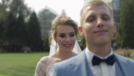 Newlyweds.-Caucasian-groom-with-bride-in-the-park.-Wedding-couple.-Happy-family