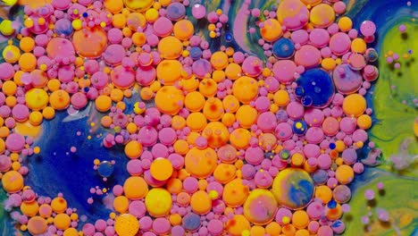 Macro-structure-of-multicolored-water-paint-oil-bubbles-movement,-bright-colorful-acrylic-painting