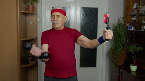 Old-senior-grandfather-man-doing-workout-with-dumbbells,-training,-fitness,-sport-activity-at-home