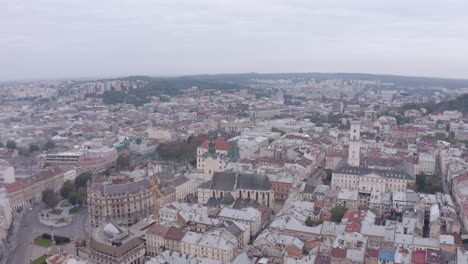 Aerial-Drone-Video-of-European-City-Lviv,-Ukraine,-Rynok-Square,-Central-Town-Hall,-Dominican-Church