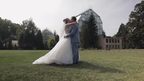 Newlyweds.-Caucasian-groom-with-bride-in-the-park.-Wedding-couple.-Happy-family