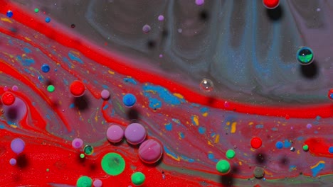 Bright-neon-colorful-bubbles-oil-and-ink,-acrylic-paint-moving-close-up,-wallpaper-background