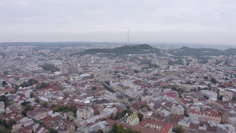 Aerial-Drone-Video-of-European-City-Lviv,-Ukraine,-Rynok-Square,-Central-Town-Hall,-Dominican-Church