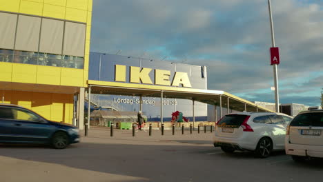 Vehicles-and-a-cyclist-leave-a-Swedish-Ikea-store