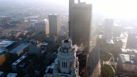 Aerial-view-overlooking-the-Leveque-Tower,-in-Columbus,-USA---tilt,-drone-shot