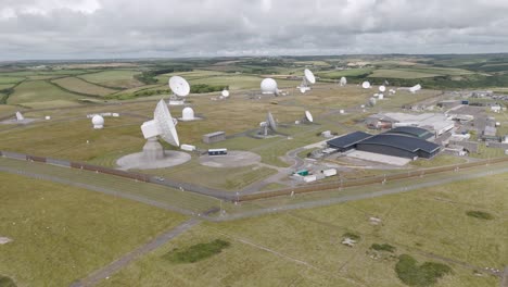 Aerial-view-of-the-GCHQ-and-NSA-repeater-station-and-listening-post-in-Bude,-Cornwall,-United-Kingdom,-with-numerous-satellite-dishes