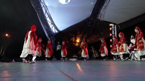 Folk-dance-of-Kosovo-women-dressed-in-beautiful-red-and-white-traditional-clothes