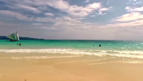 Typical-morning-at-Boracay-Beach,-a-popular-tourist-destination-in-the-Philippines-known-for-its-lovely-weather-and-long-stretches-of-white-sand