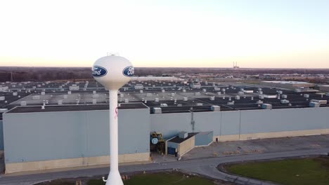 Water-Tower-In-Front-Of-Ford-Woodhaven-Stamping-Plant-In-Wyandotte,-Michigan---aerial-drone