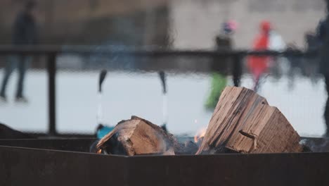 Close-up-of-warming-fire-at-outdoor-ice-skating-rink