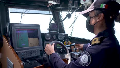 Mexican-marines-sailing-and-driving-at-the-bridge-of-a-a-patrol-boat