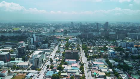 Victoria-Island-Lagos,-Nigeria---24-June-2021:-Drone-view-of-major-roads-and-traffic-in-Victoria-Island-Lagos-showing-the-cityscape,-offices-and-residential-buildings