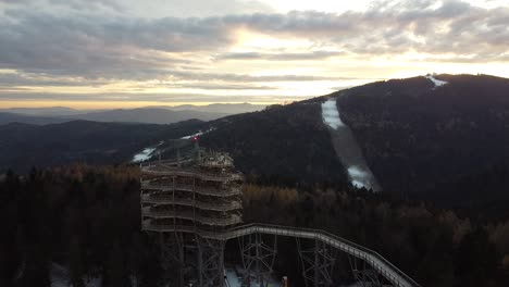 sunset-and-a-huge-wooden-viewing-point-in-mountains