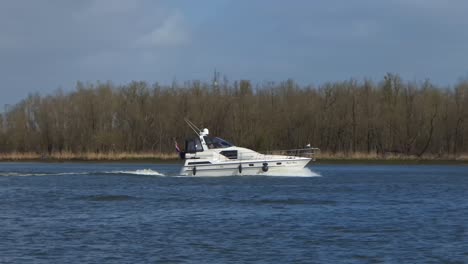 Luxury-motor-yacht-sails-on-the-river