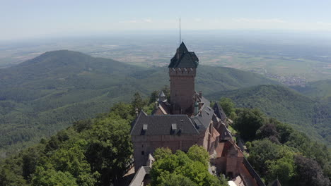 Circulating-aerial-shot-showing-details-of-a-renovated-medieval-castle-in-the-Alsace-region-of-France