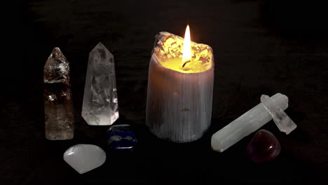 Crystals-and-candle-burning-during-a-candle-magick-ritual