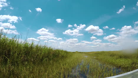 POV-shot-riding-an-airboat-in-Everglades-National-Park,-Florida,-scenic-shot