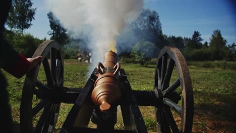 Classic-war-cannon-of-Napoleon-times-firing-a-bullet